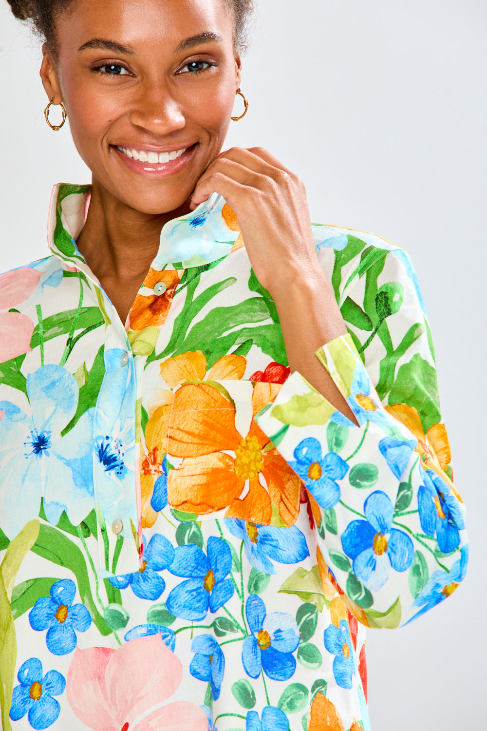 Woman in floral print tunic