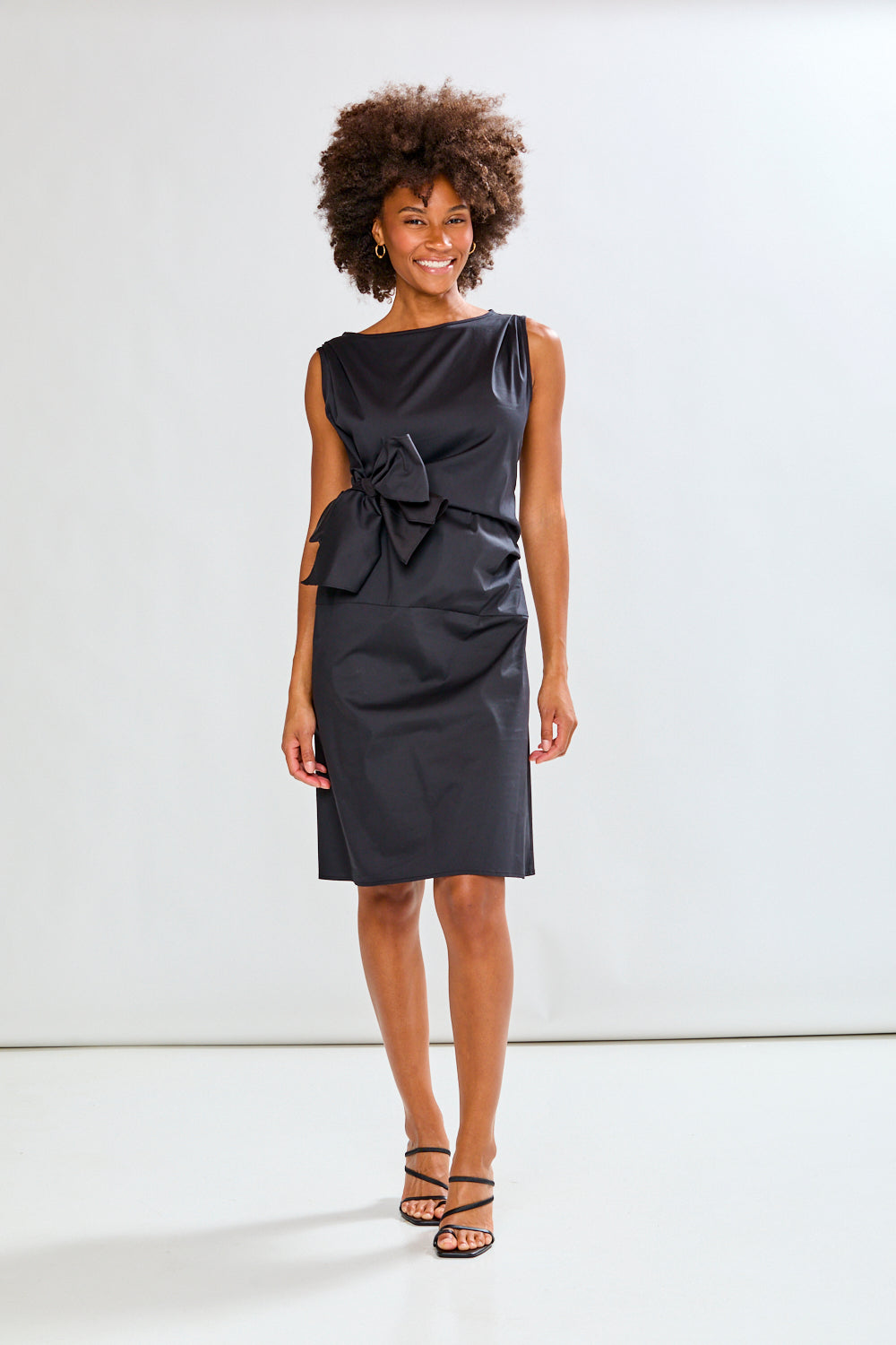 woman in a black dress