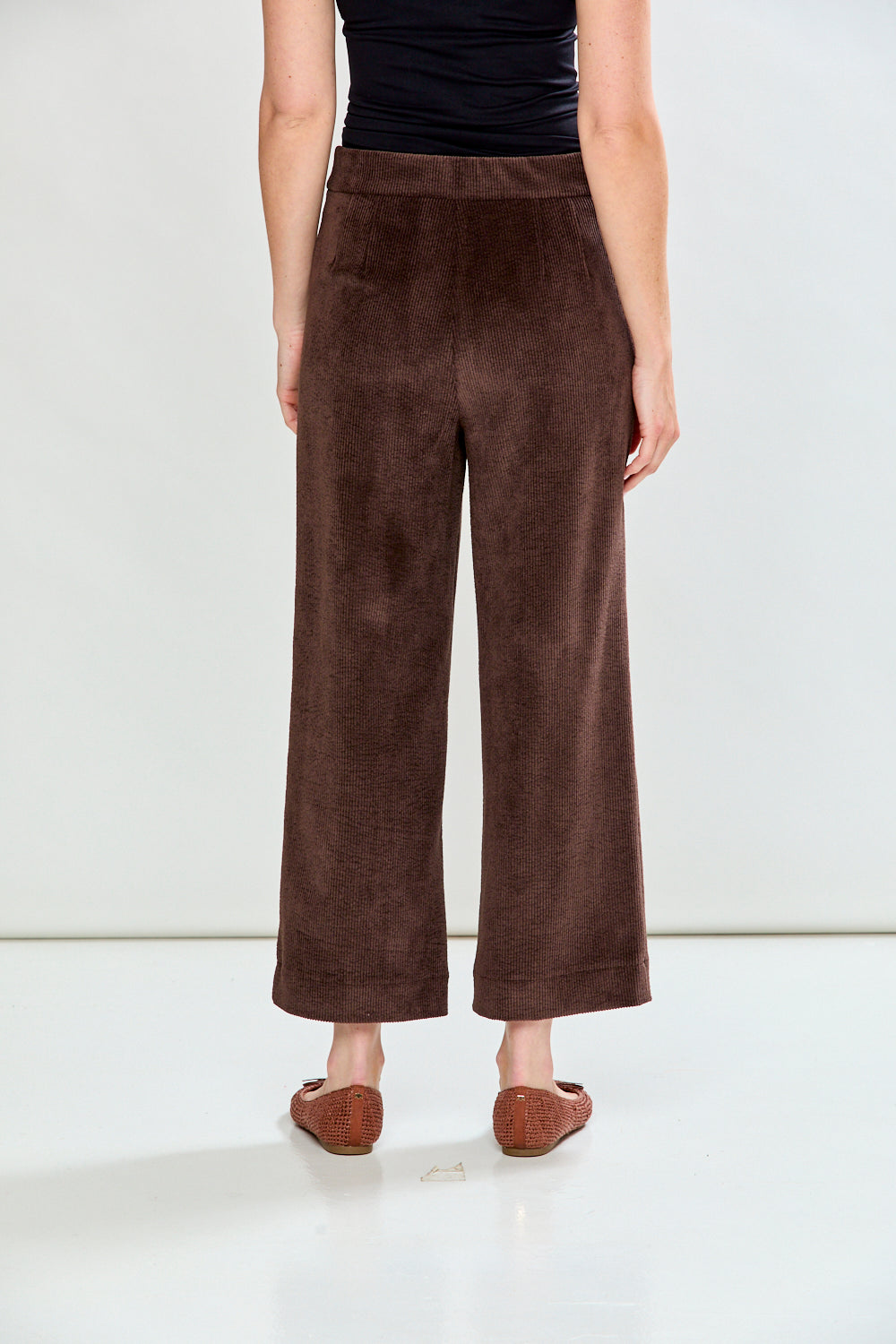Woman in espresso corduroy pant