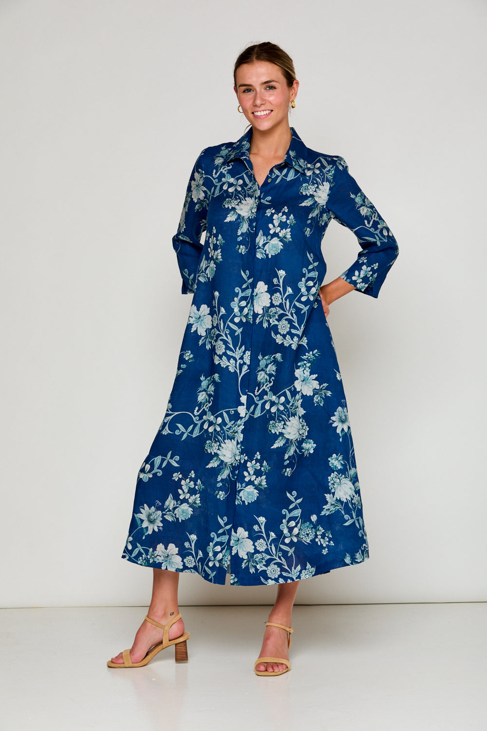 Woman in navy floral dress