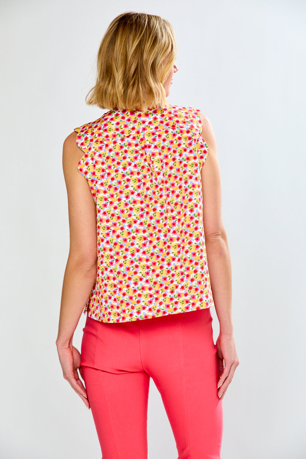 woman in pink floral blouse