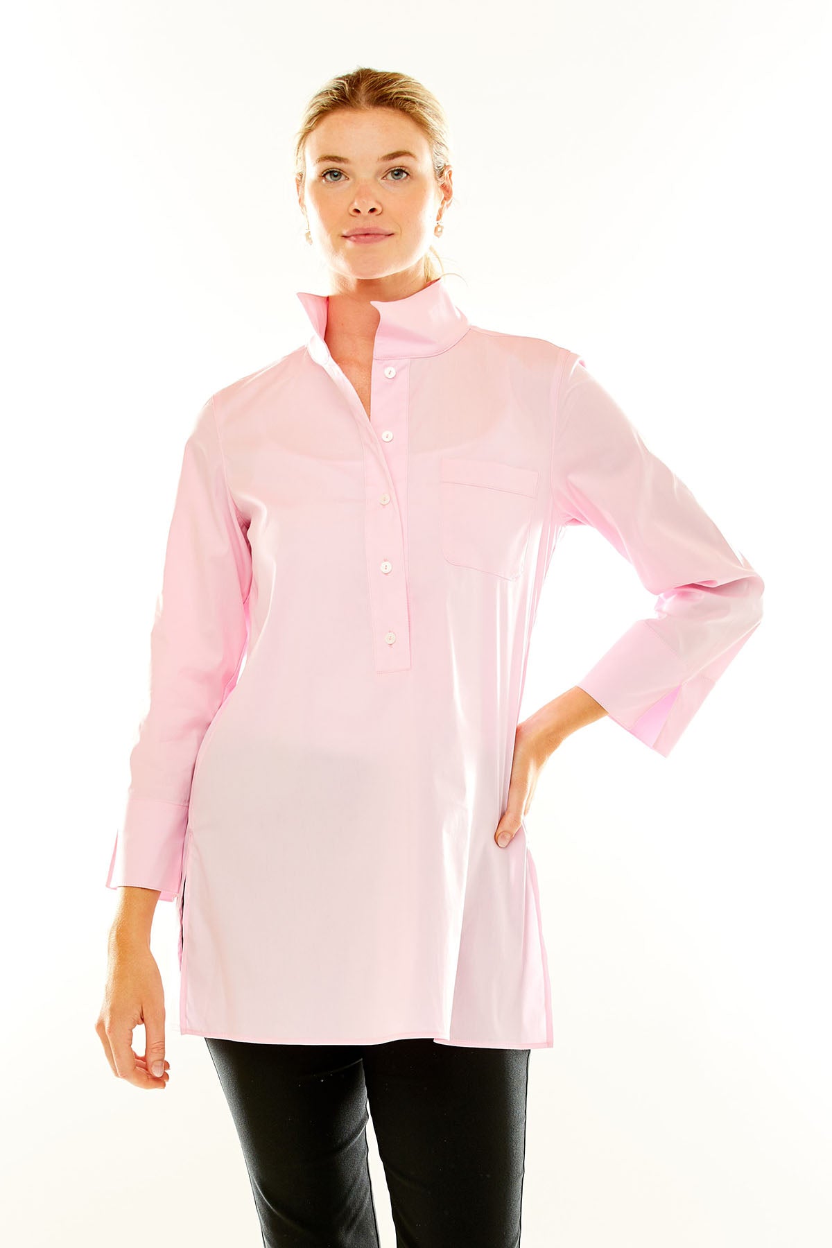 Woman in pink tunic