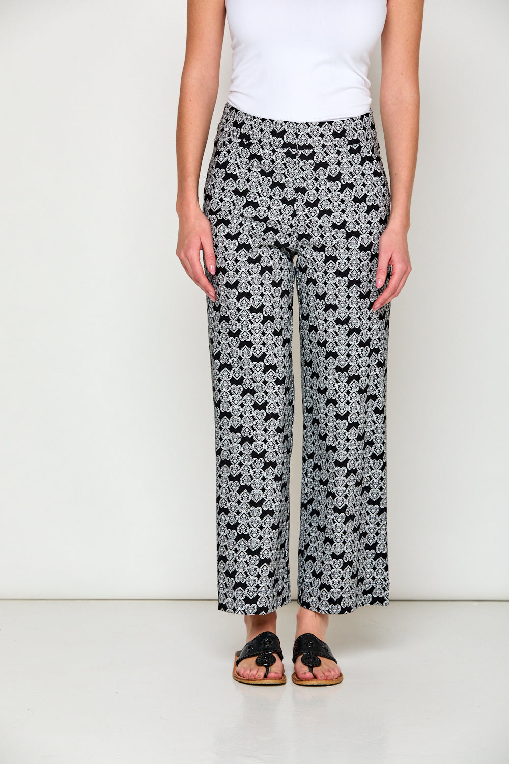 Woman in black and white print pants