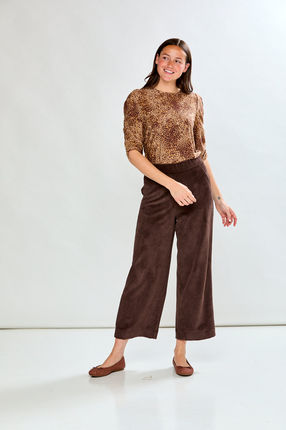 Woman in espresso corduroy pant