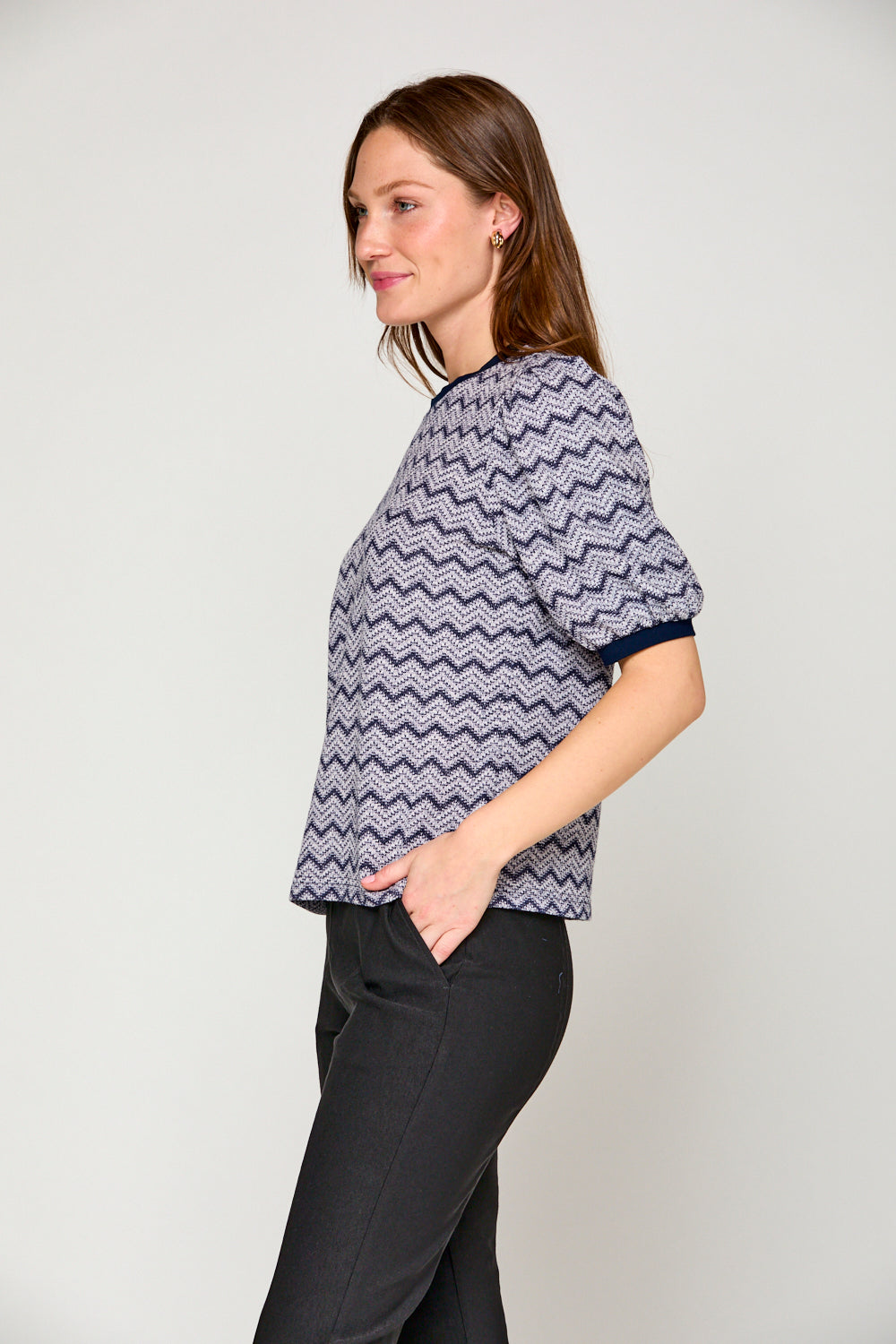 Woman in blue chevron top