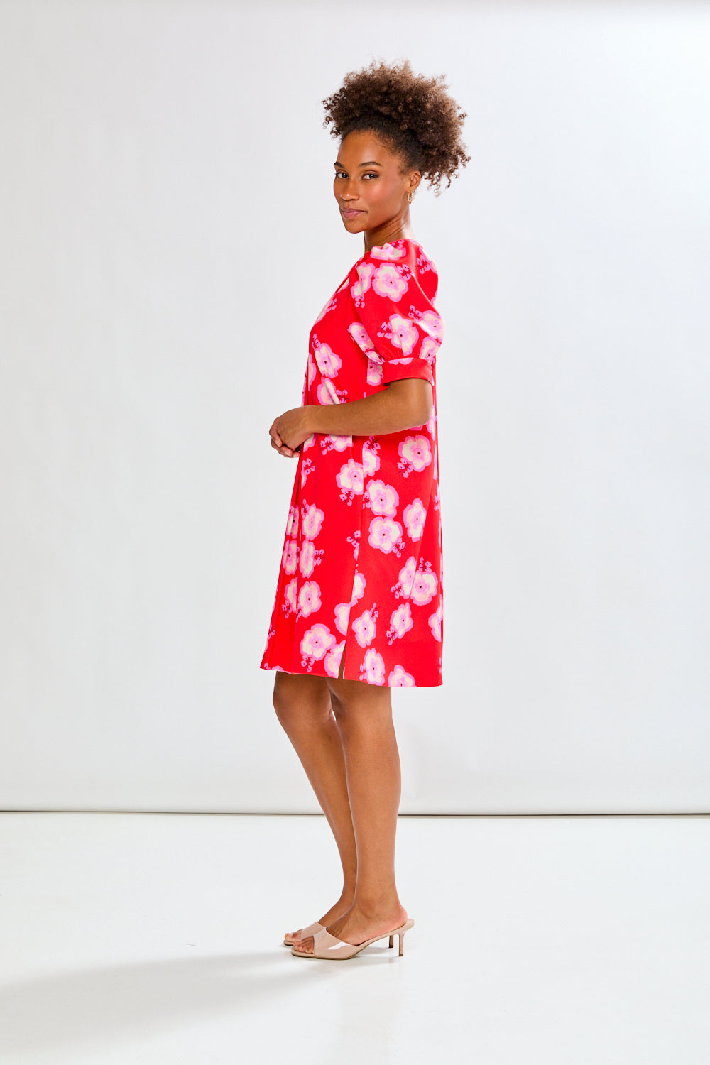 Girl in red dress with flowers