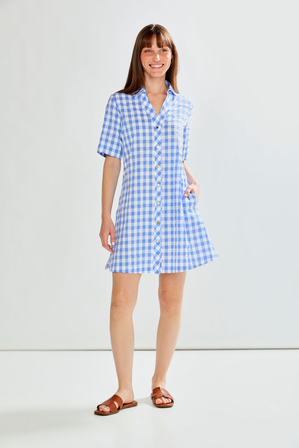 woman in check dress