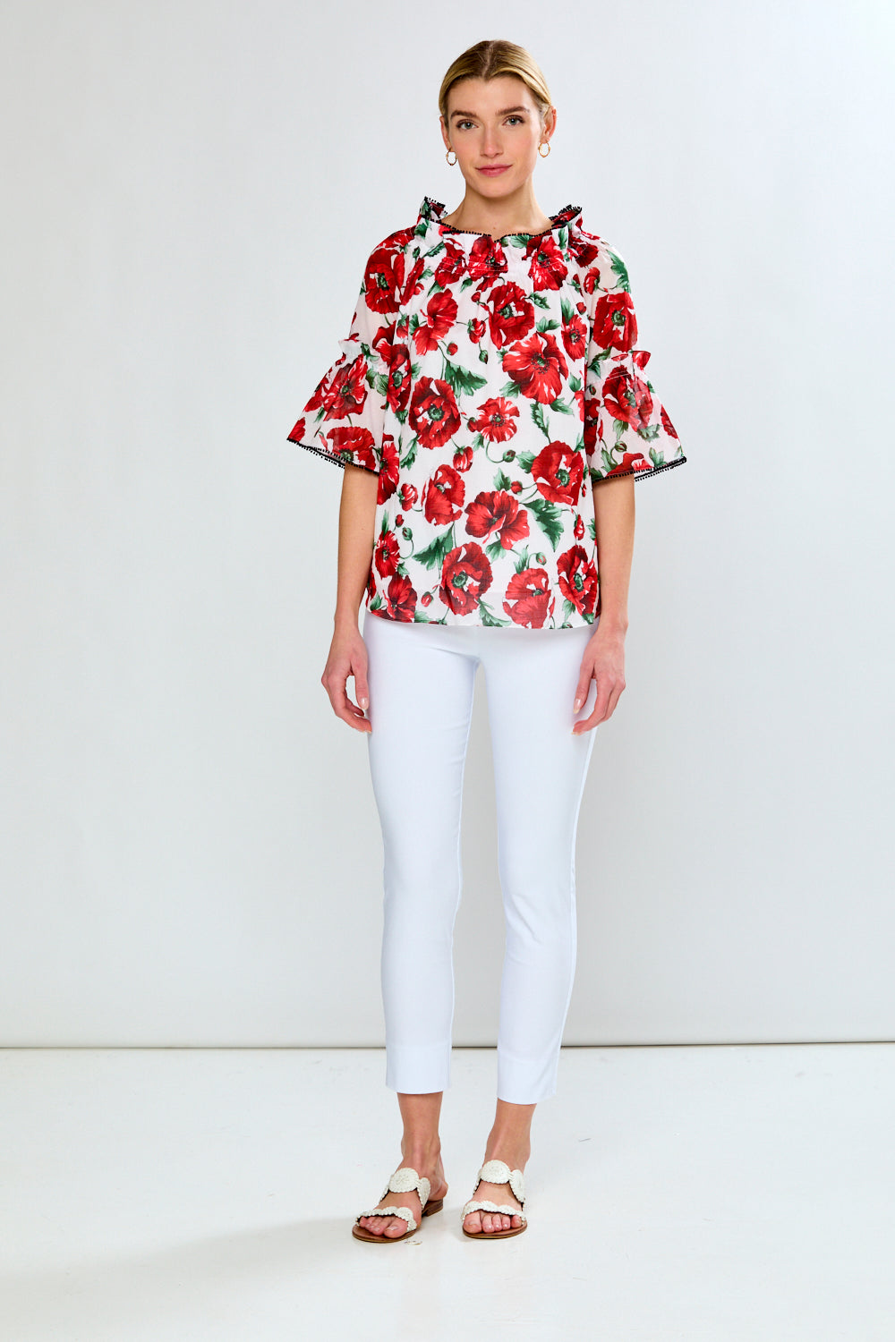 Women in floral red top with black trim