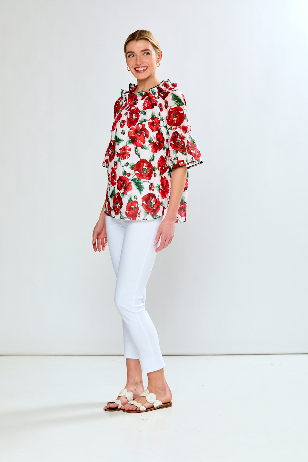 Women in floral red top with black trim