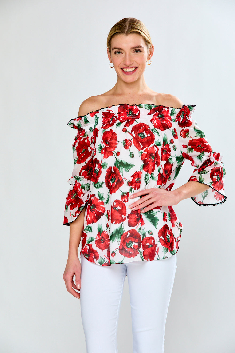 Women in floral red top with black trim