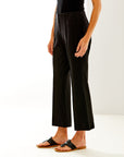 Woman in black cropped pant