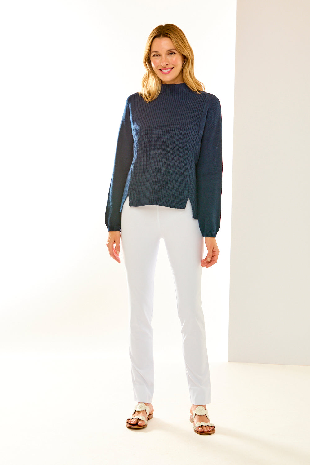 Woman in mock neck sweater