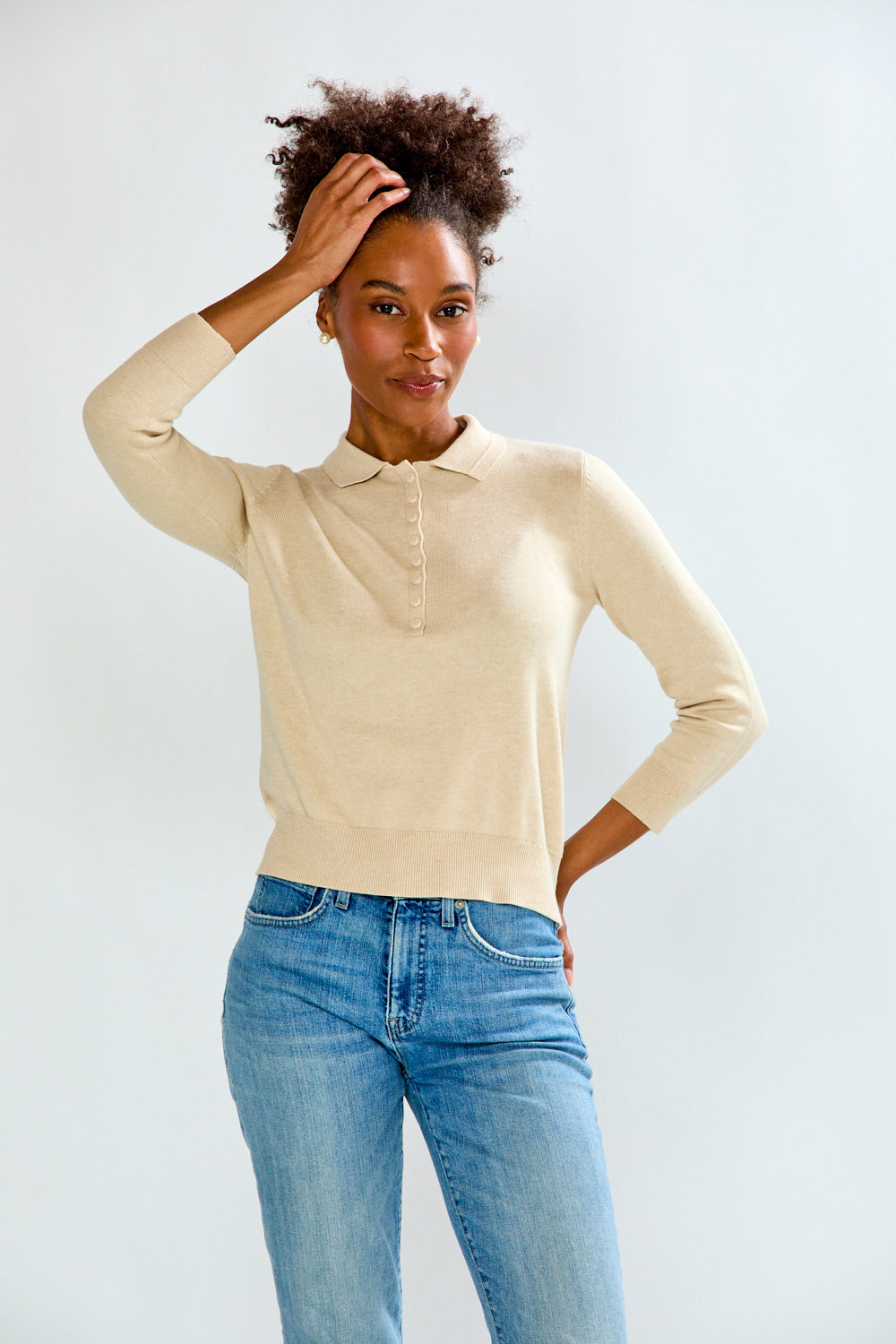 woman in sand sweater