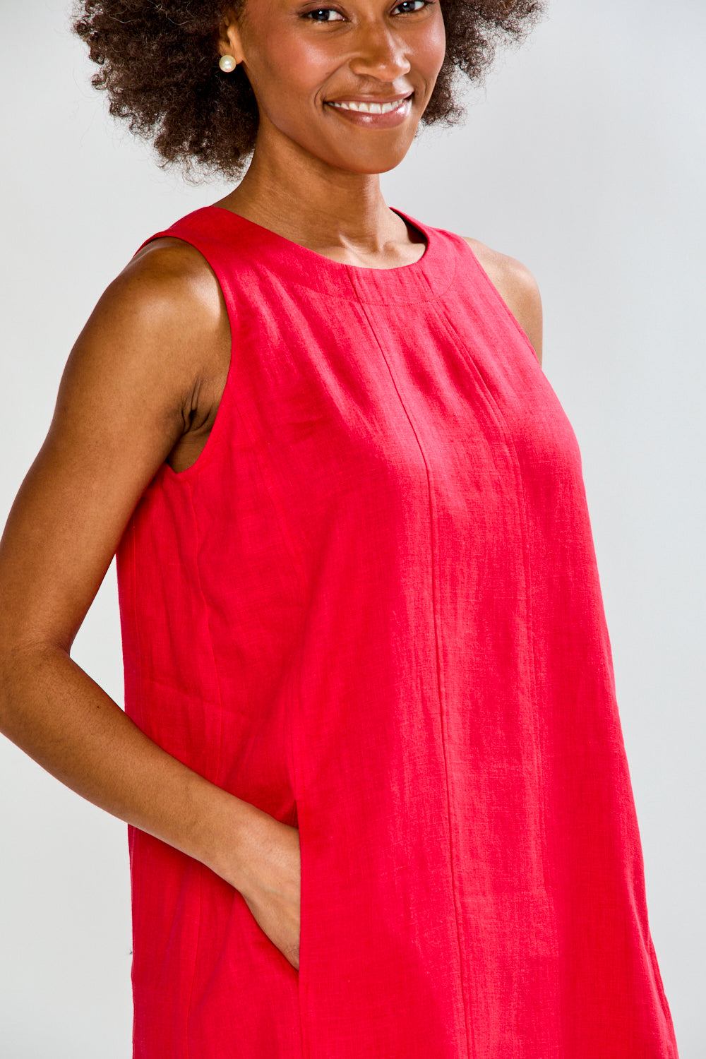 Woman in red linen dress