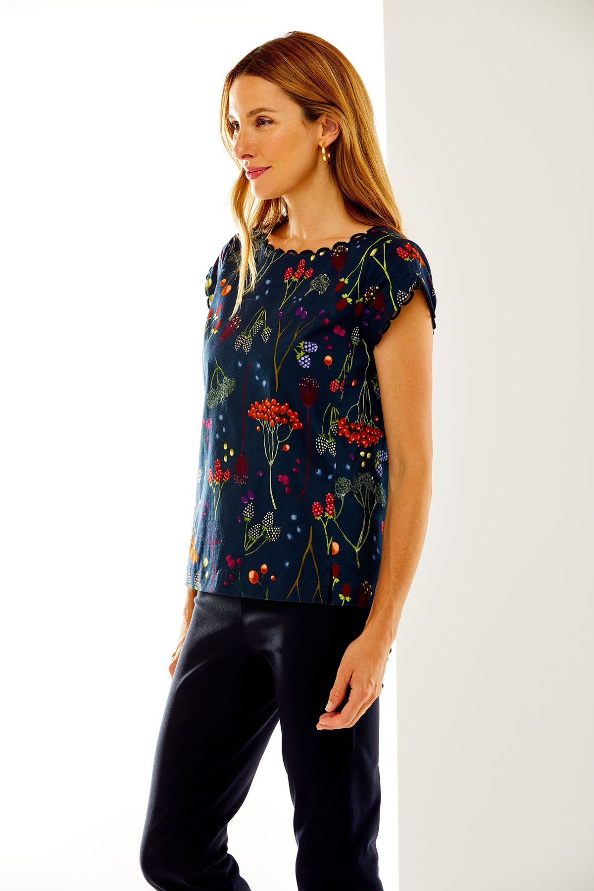Woman in floral short sleeve top