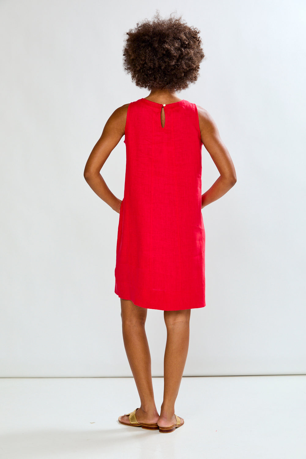 Woman in red linen dress
