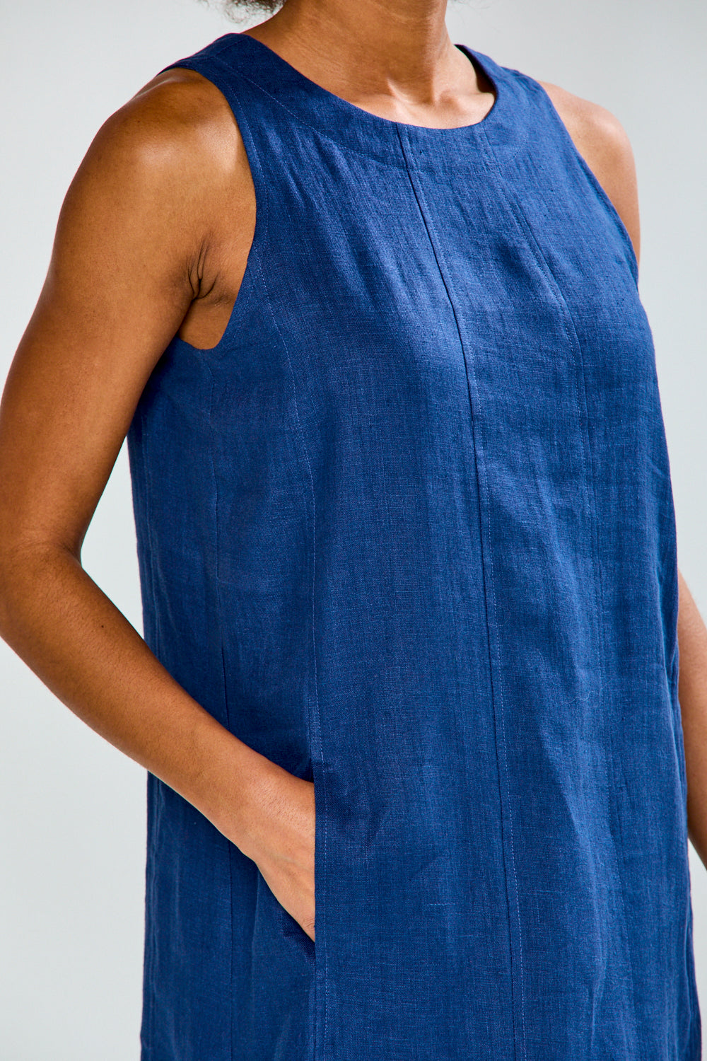 Woman in navy linen dress