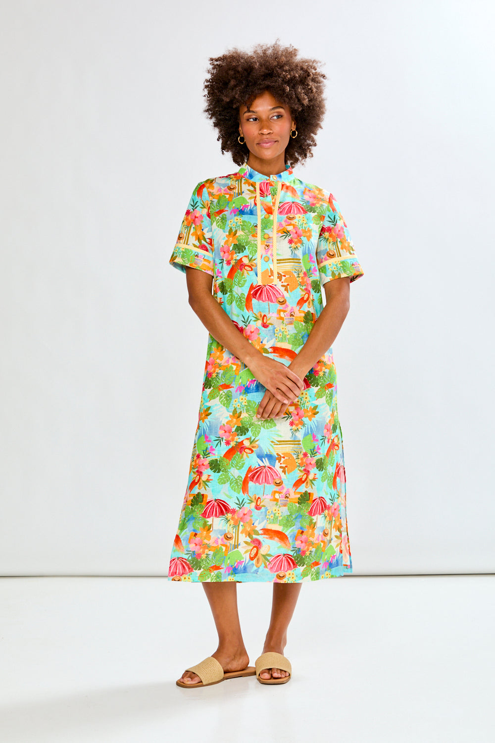 Woman in tropical full length dress