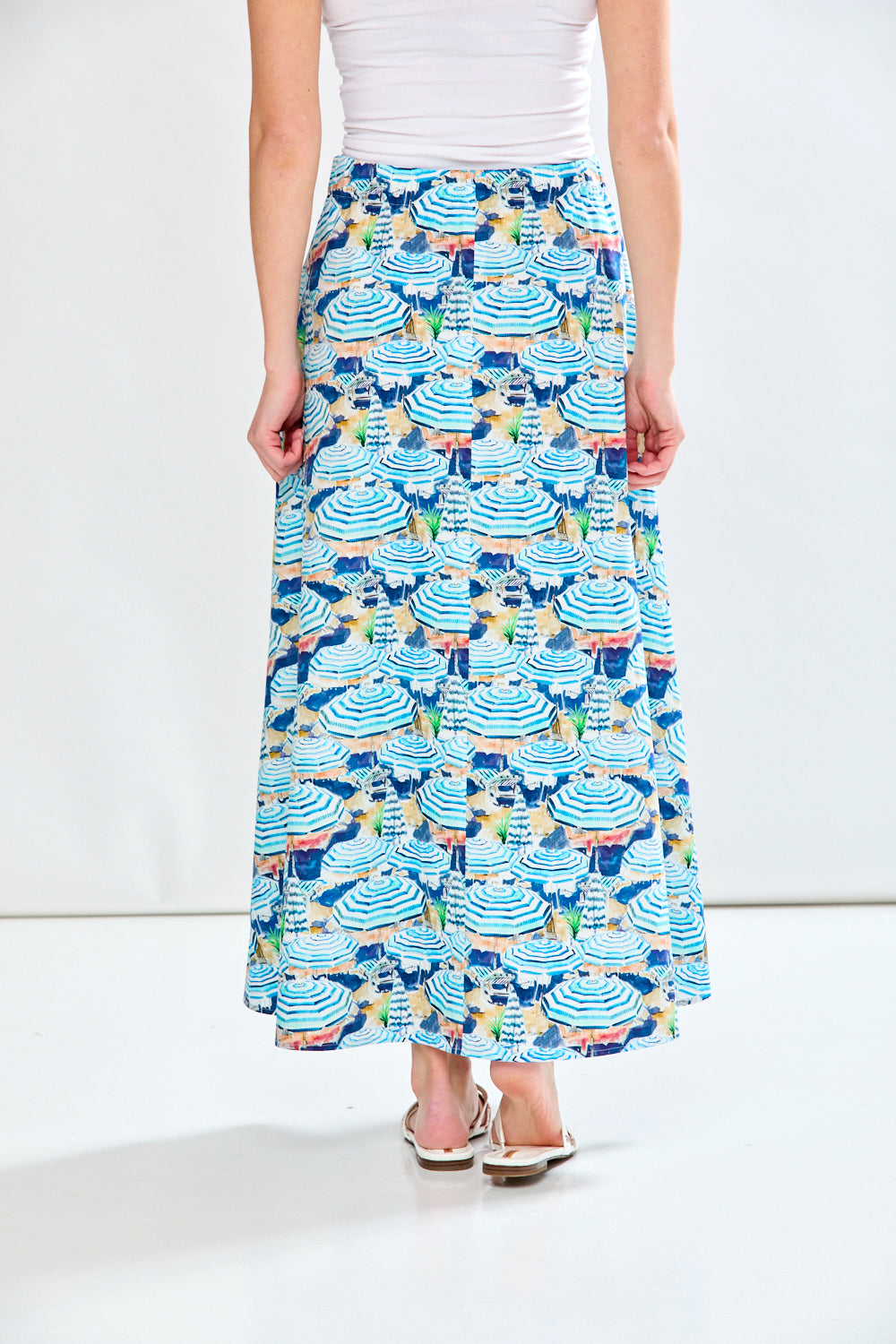 Woman in blue printed skirt
