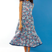 Woman in midi floral dress