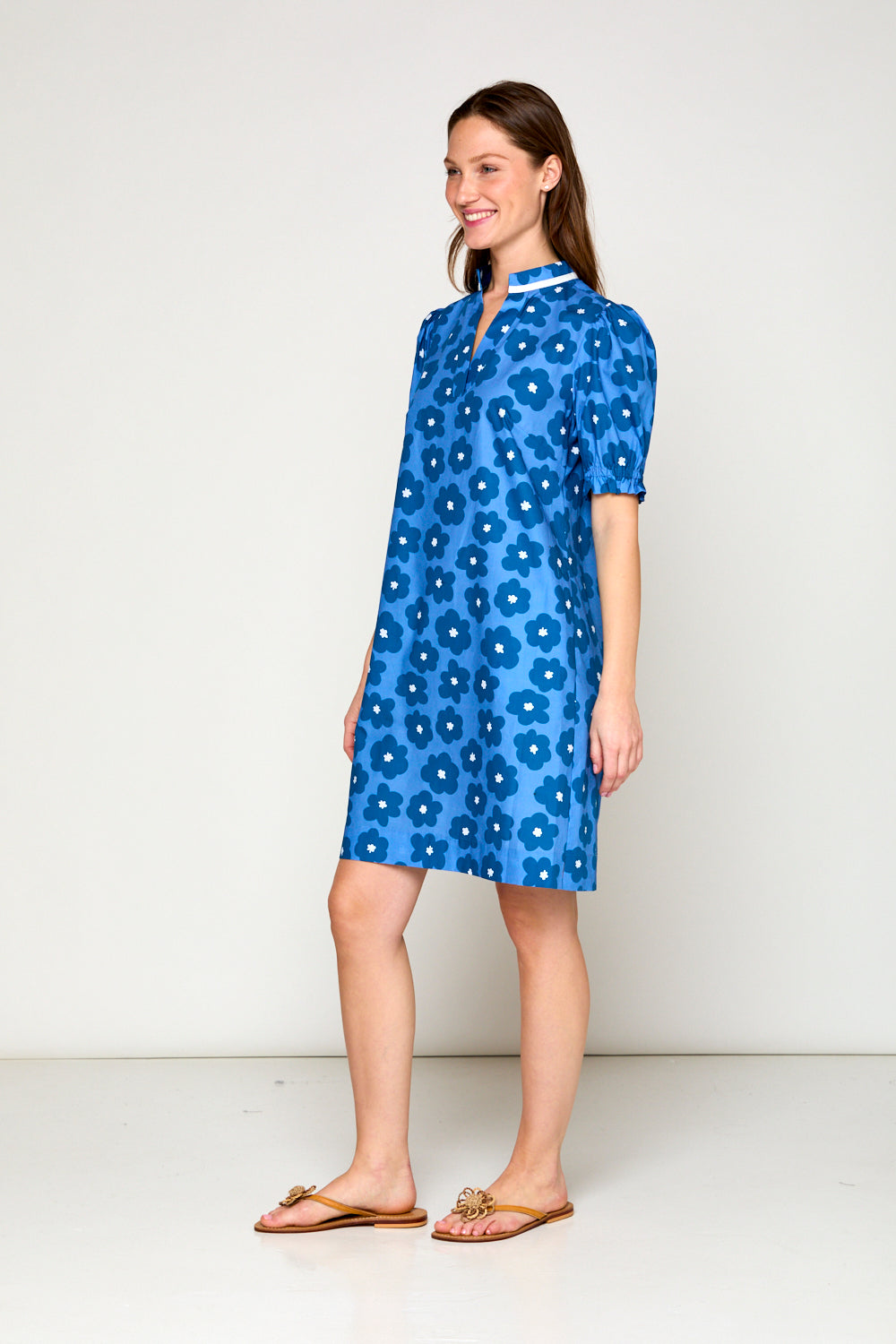 Woman in blue daisy dress