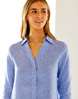 Woman in marine blue linen shirtdress