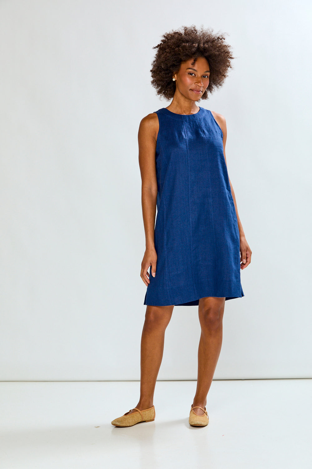Woman in navy linen dress