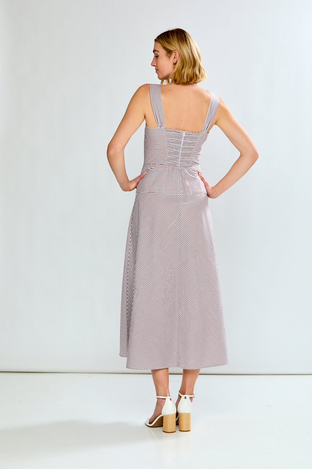 woman in striped dress