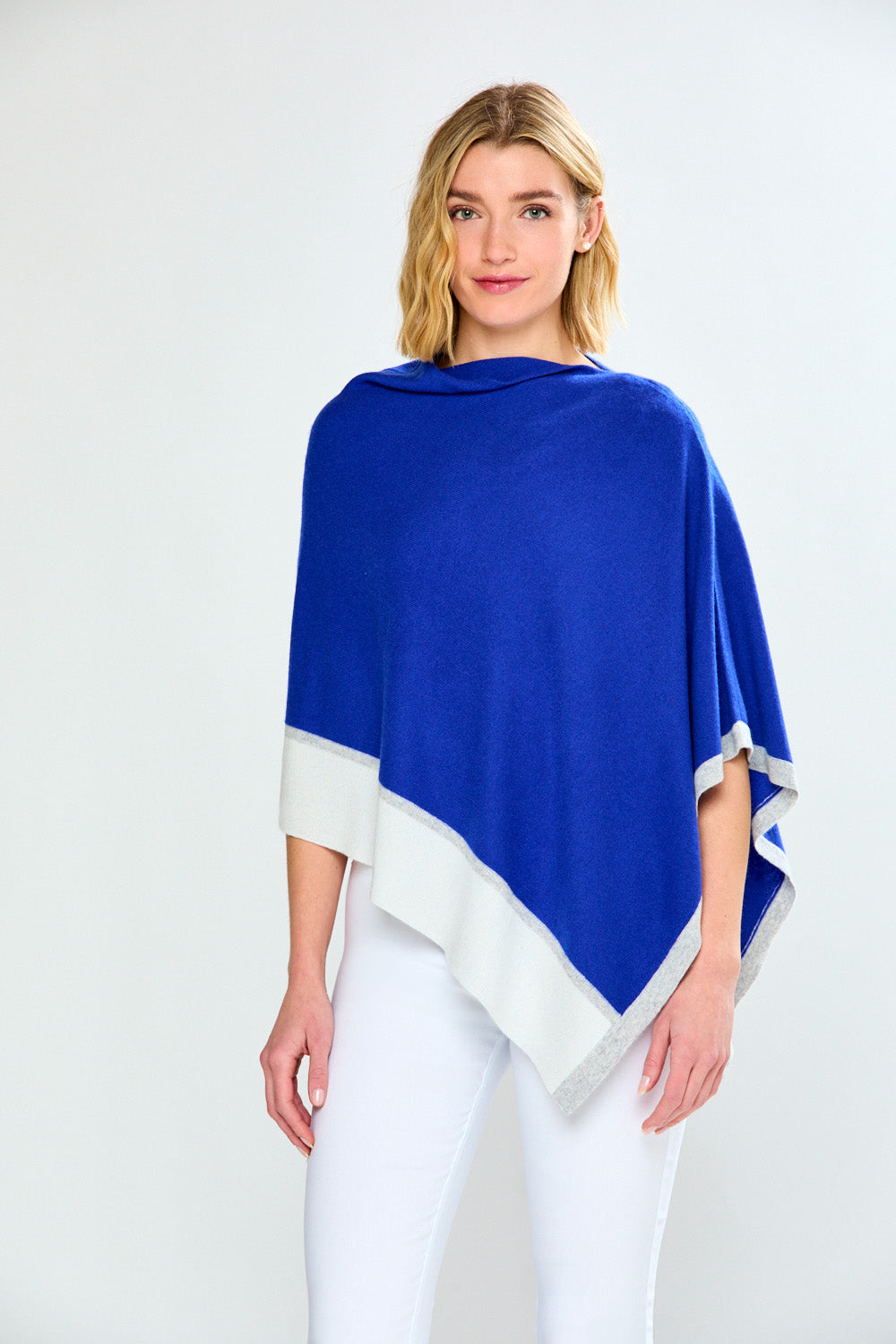 Woman wearing Striped Band Poncho in Spring Colors