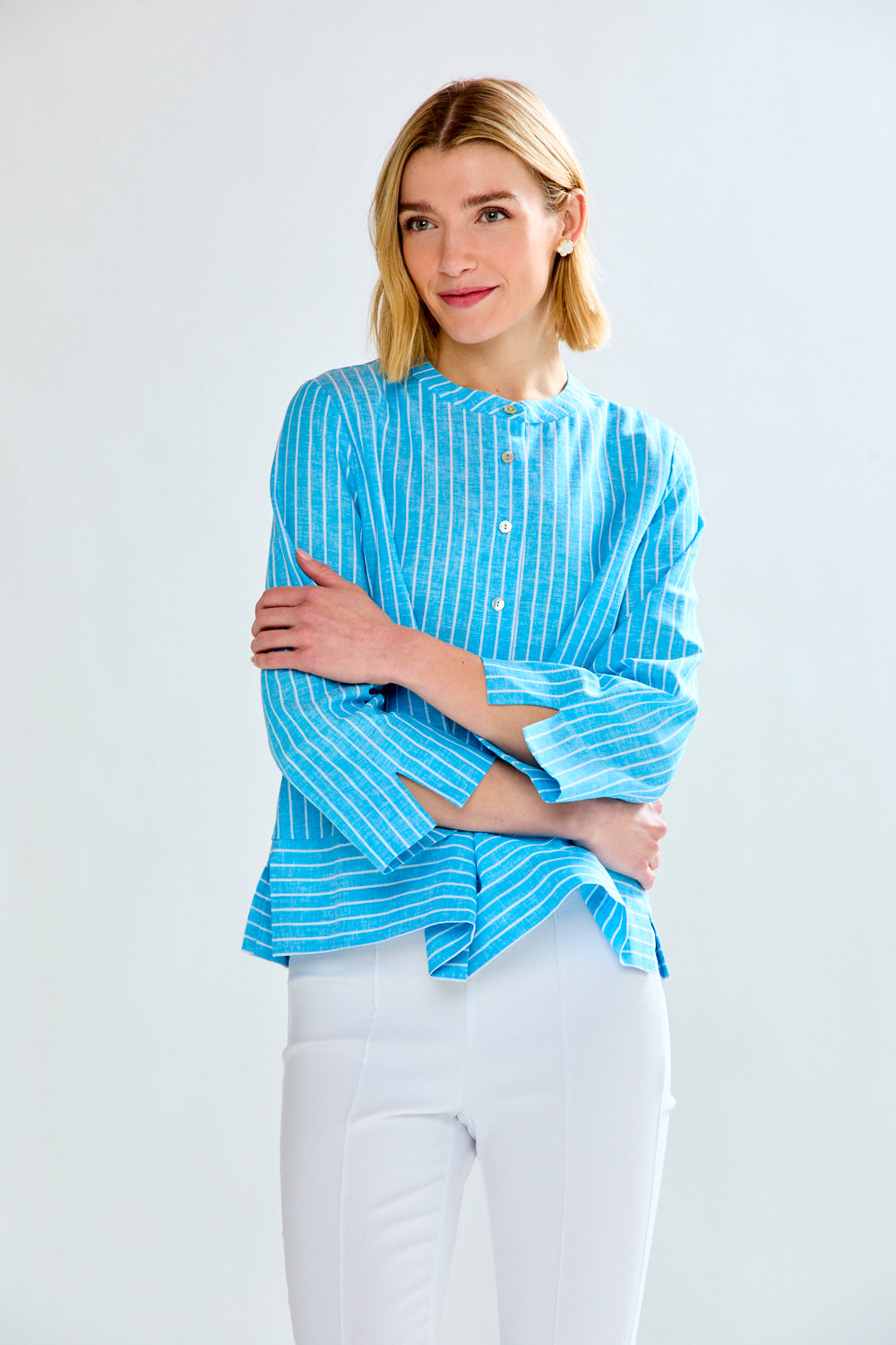 Woman in blue striped tunic