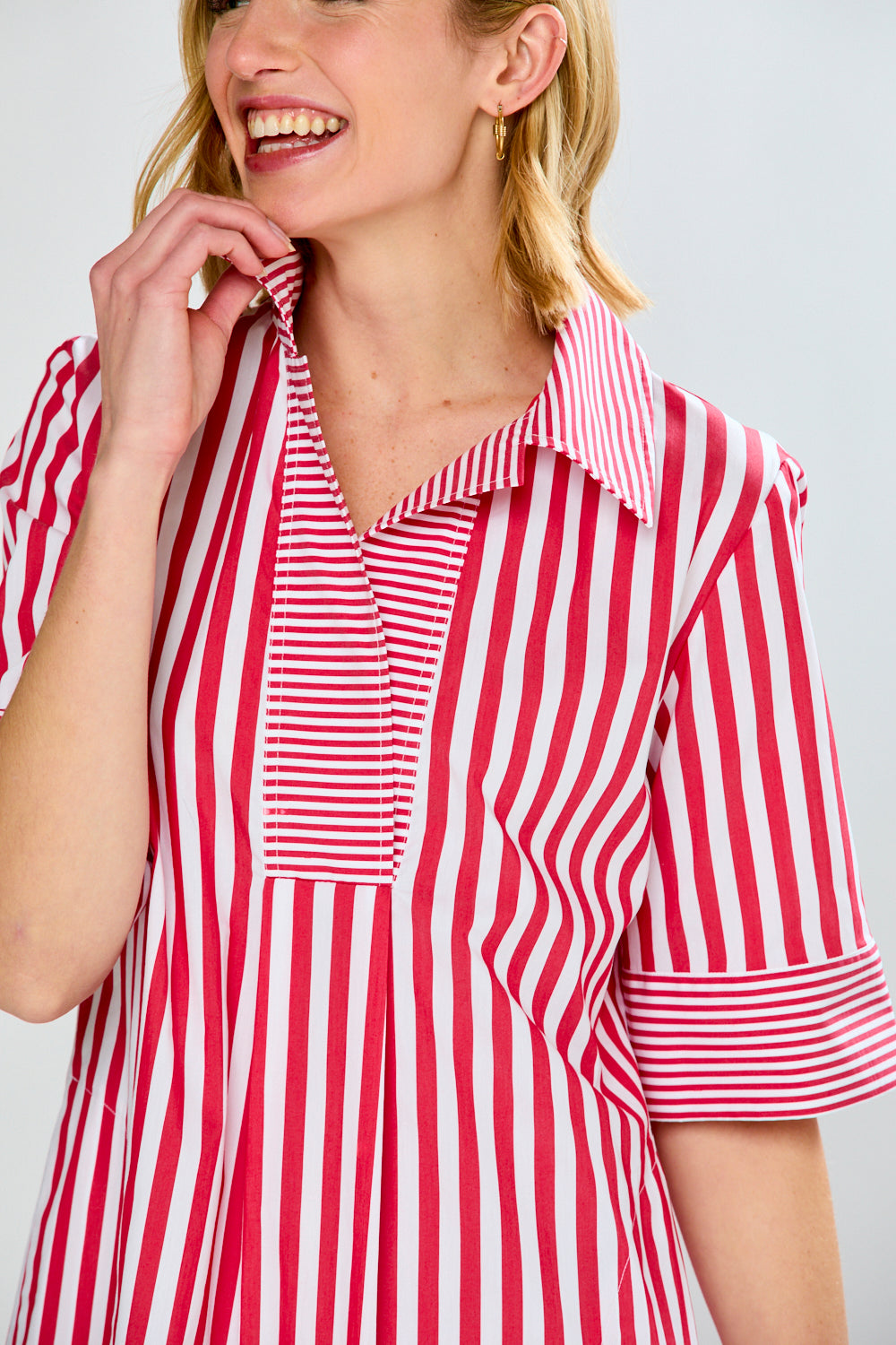 Woman in red/white stripes