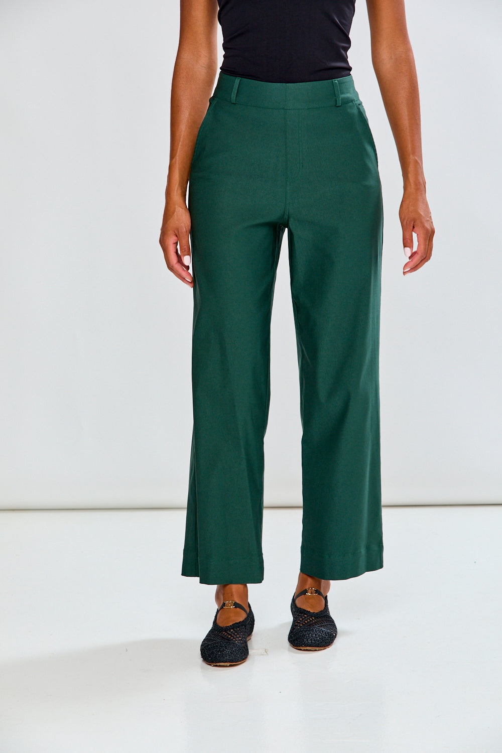 Woman in evergreen wide leg pant