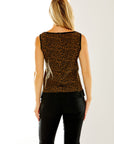 Woman in camel printed boxy fit sleeveless top