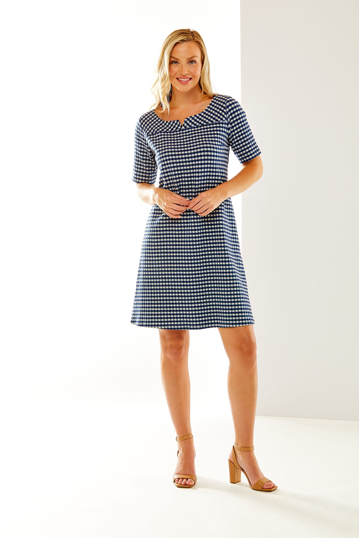 Woman in gingham dress