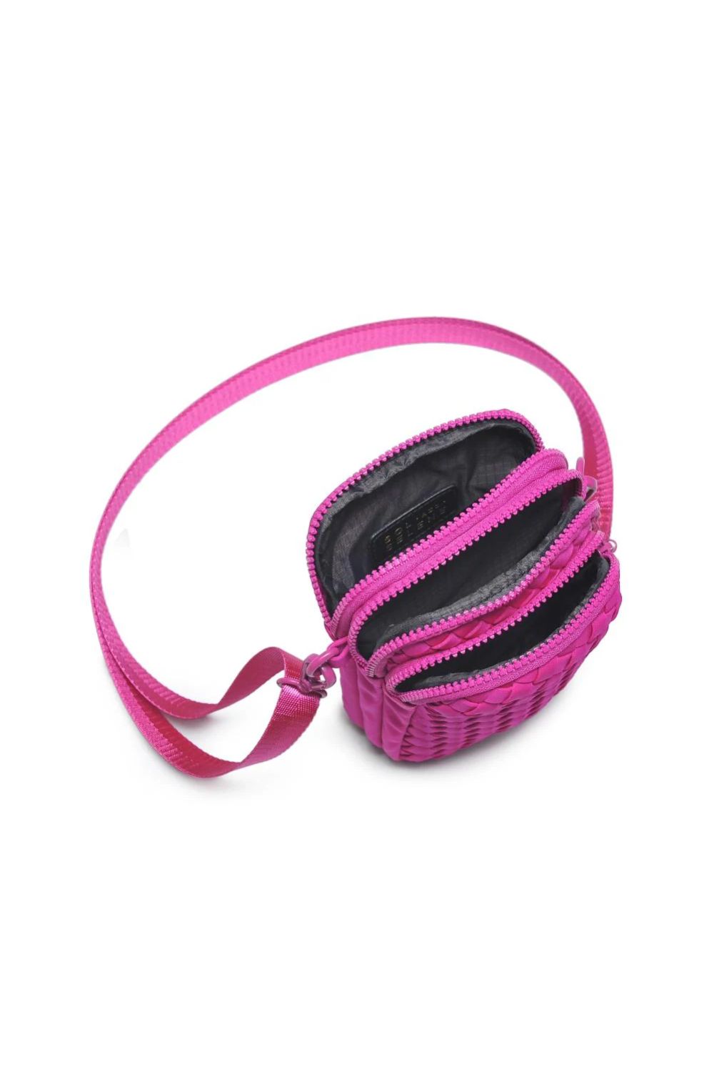  fuchsia quilted crossbody bag on a white background