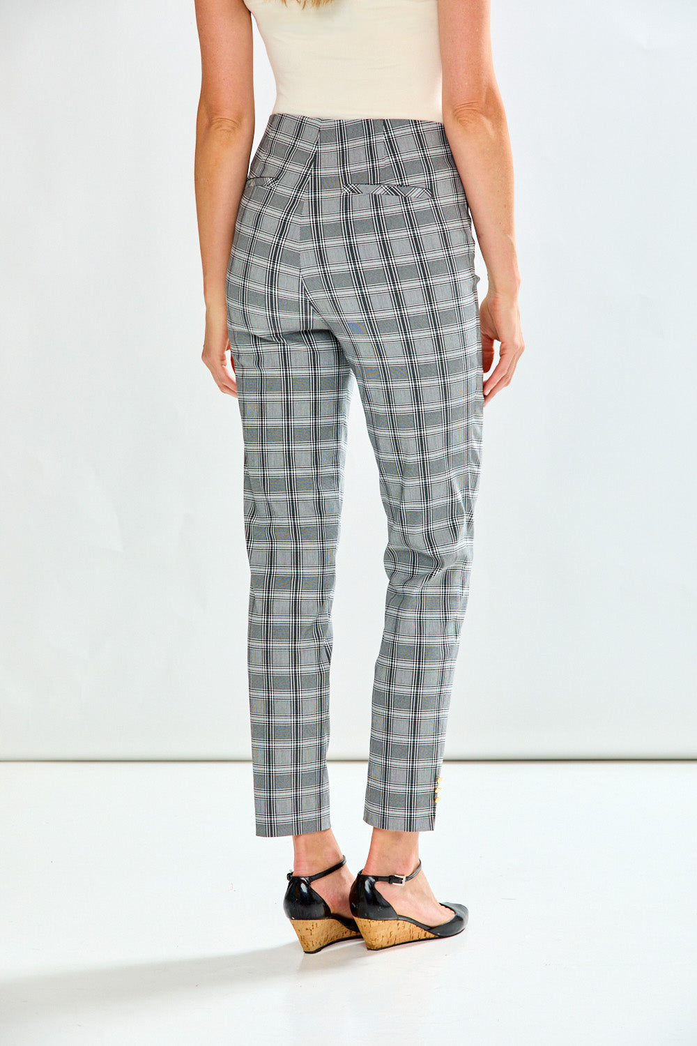 Woman wearing plaid pants 