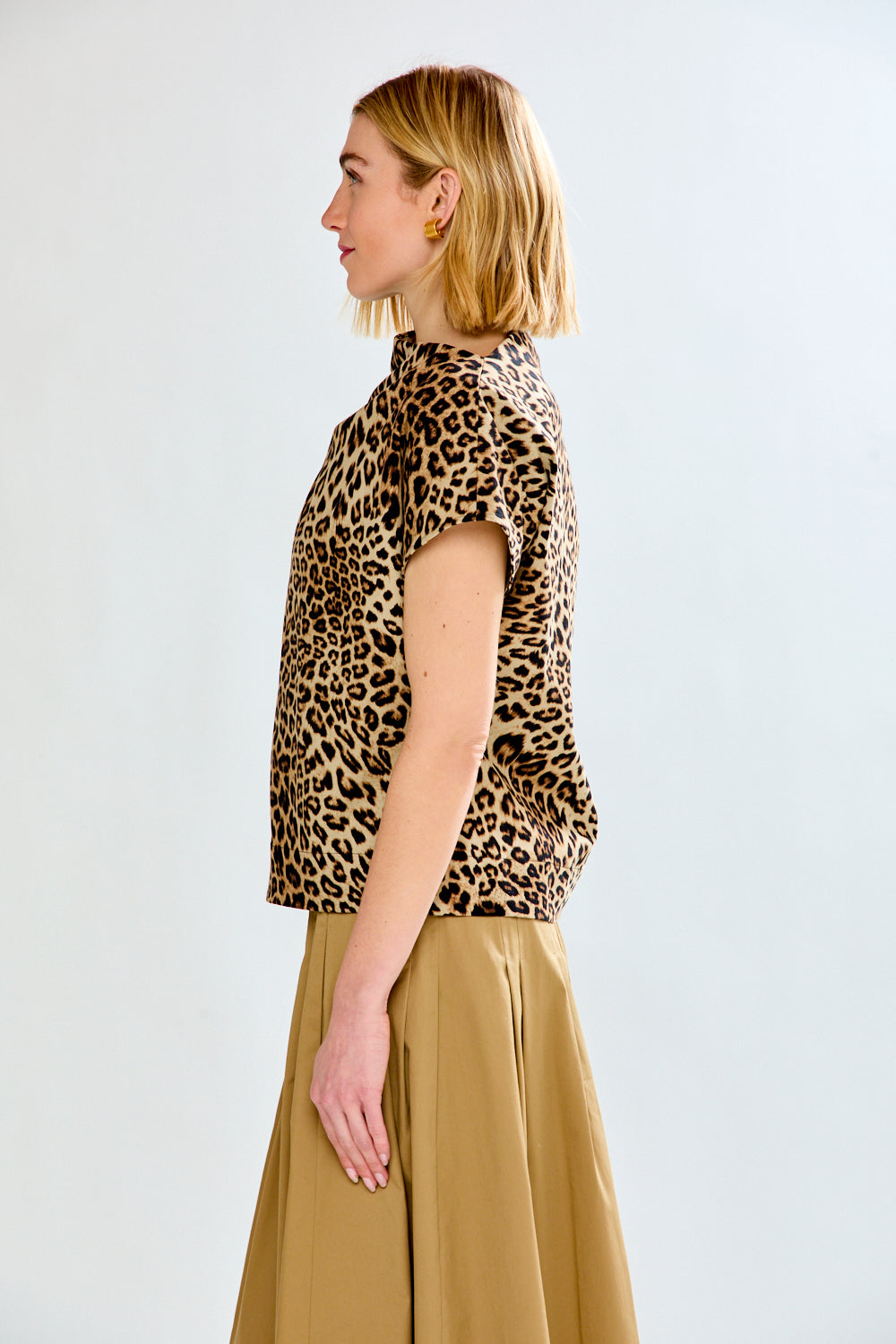 woman in leopard top