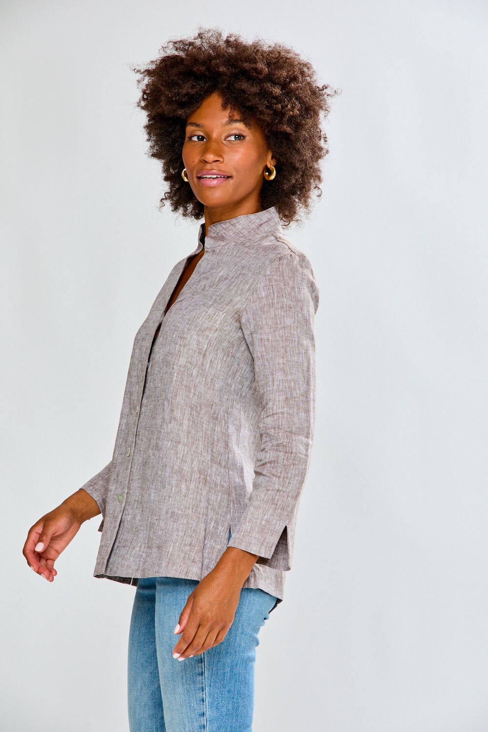 Woman in mocha linen top with jeans