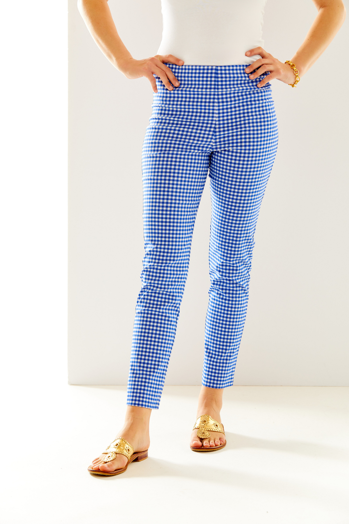 Woman in blue and white gingham pant
