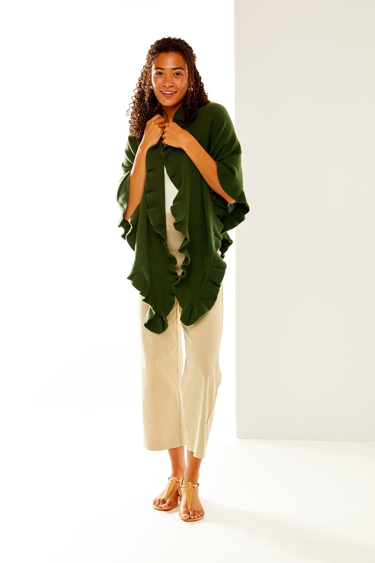 Woman in moss cashmere ruffle triangle