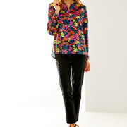 Woman in black multi floral blouse