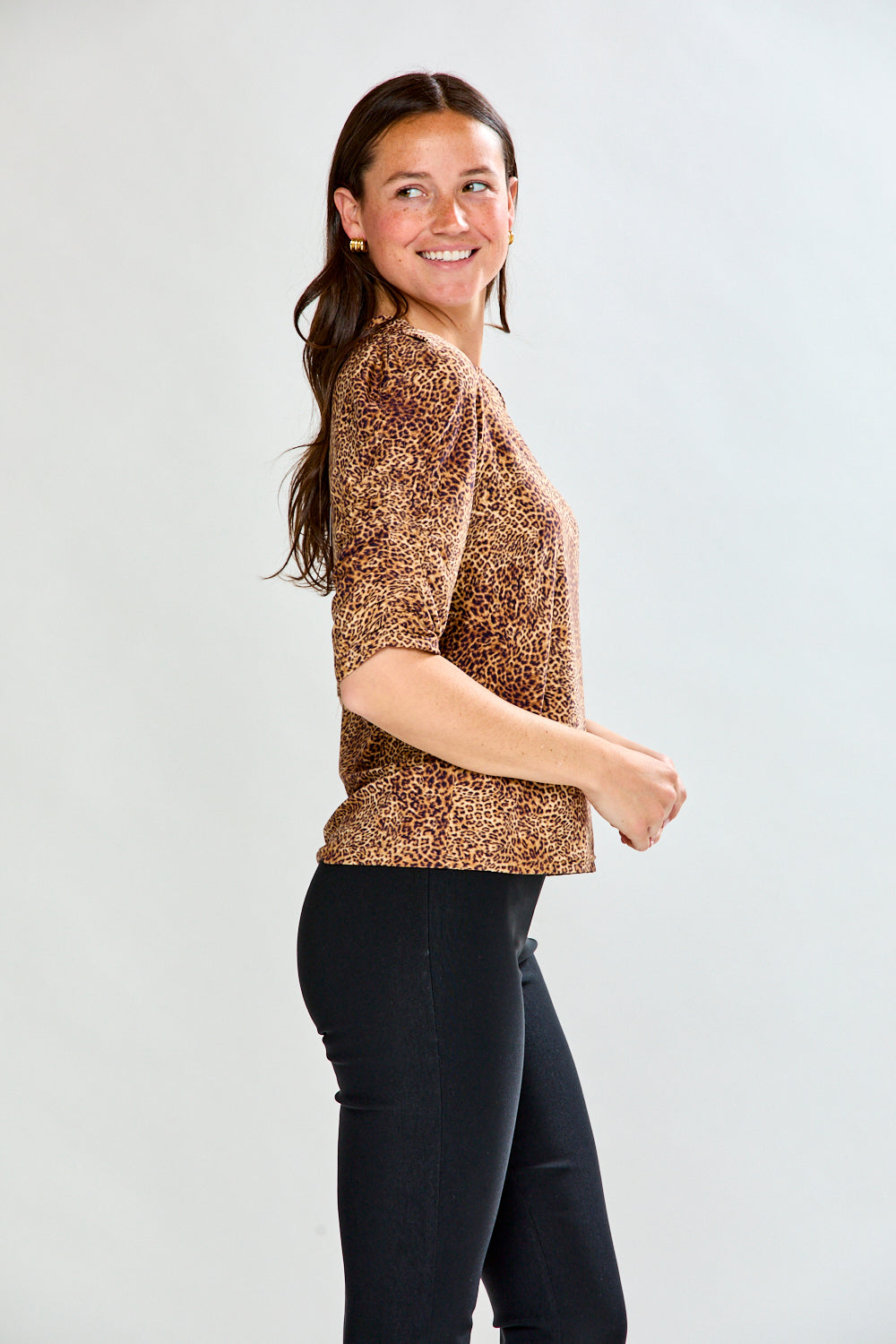 Woman in leopard print top