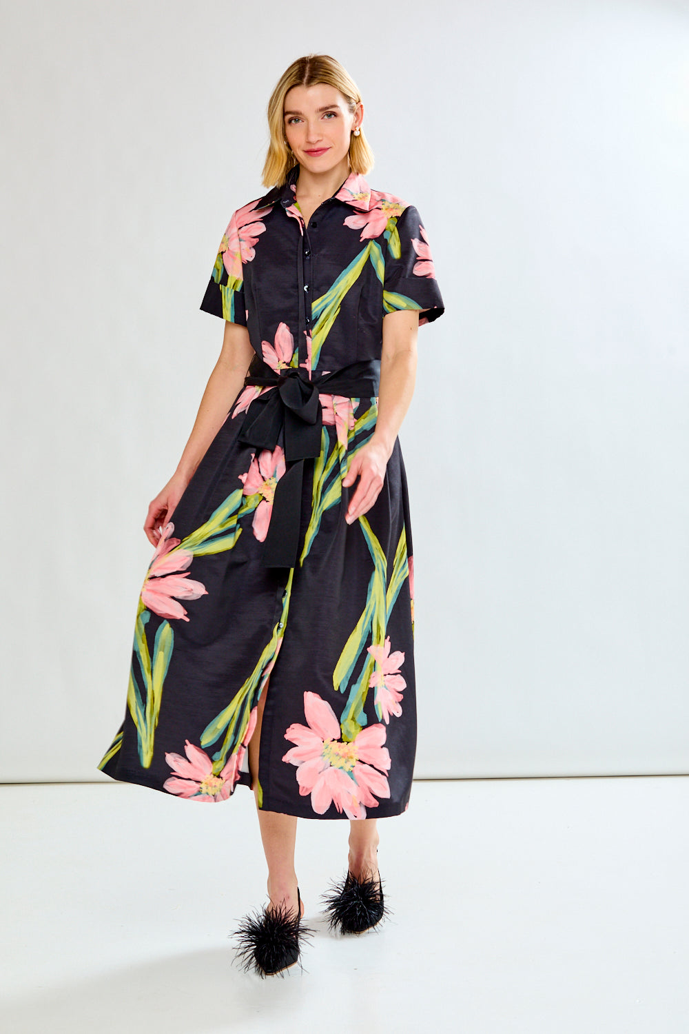 Woman wearing MARISOL DRESS IN FLORAL COSMOS - FLORAL COSMOS
