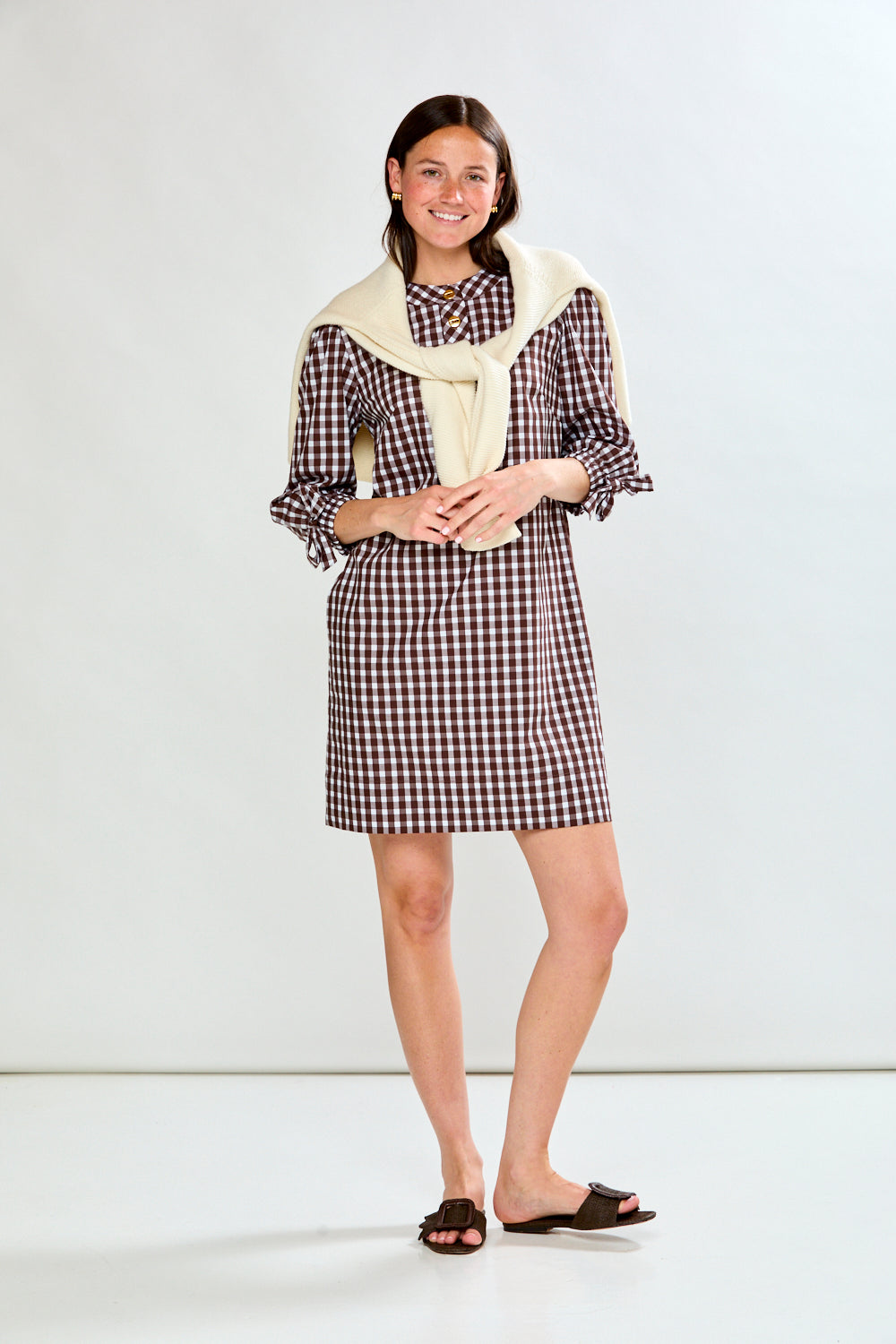 Woman in check dress