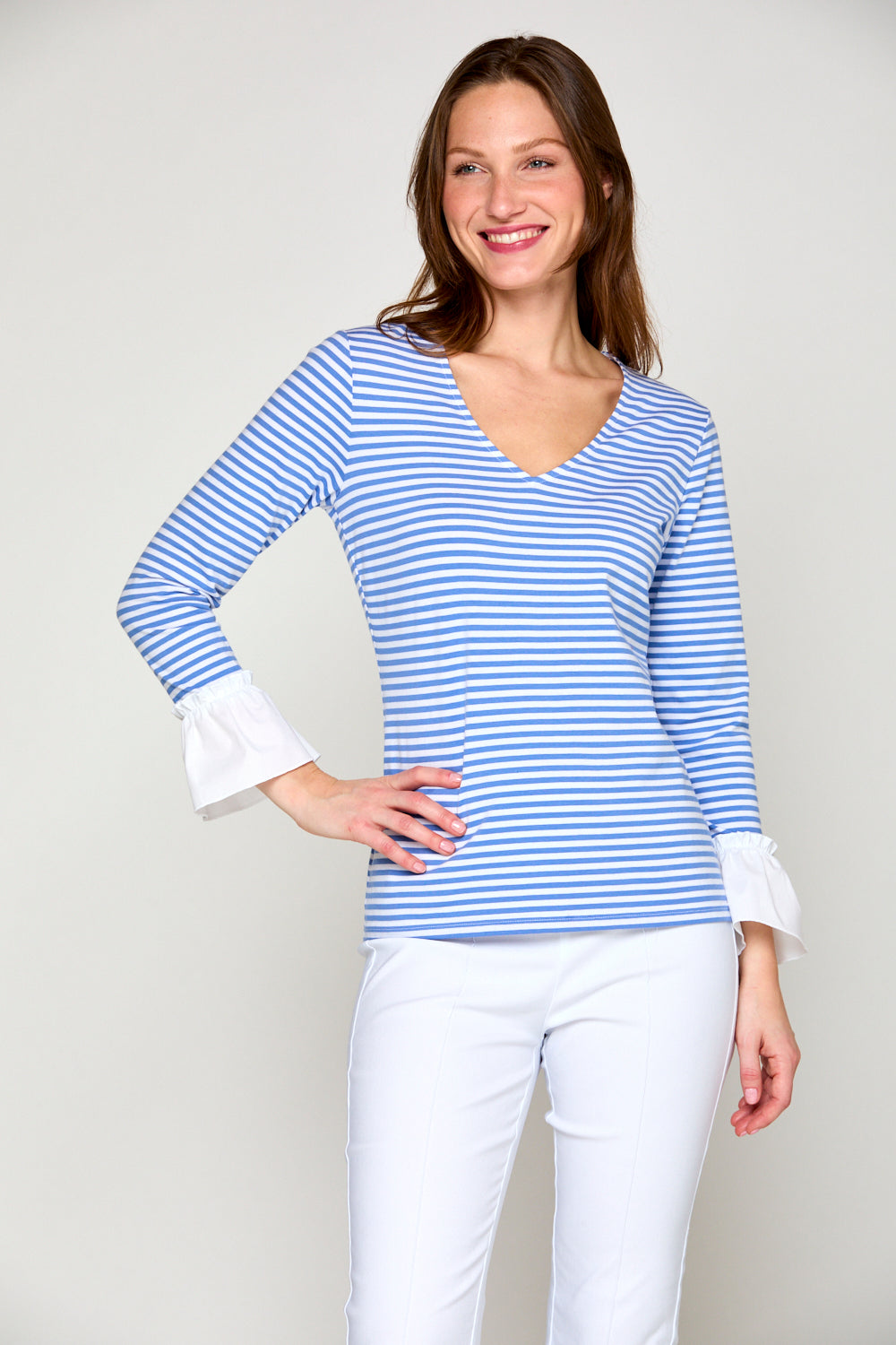 Woman in blue and white stripe top