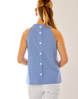 Woman in blue/white gingham top