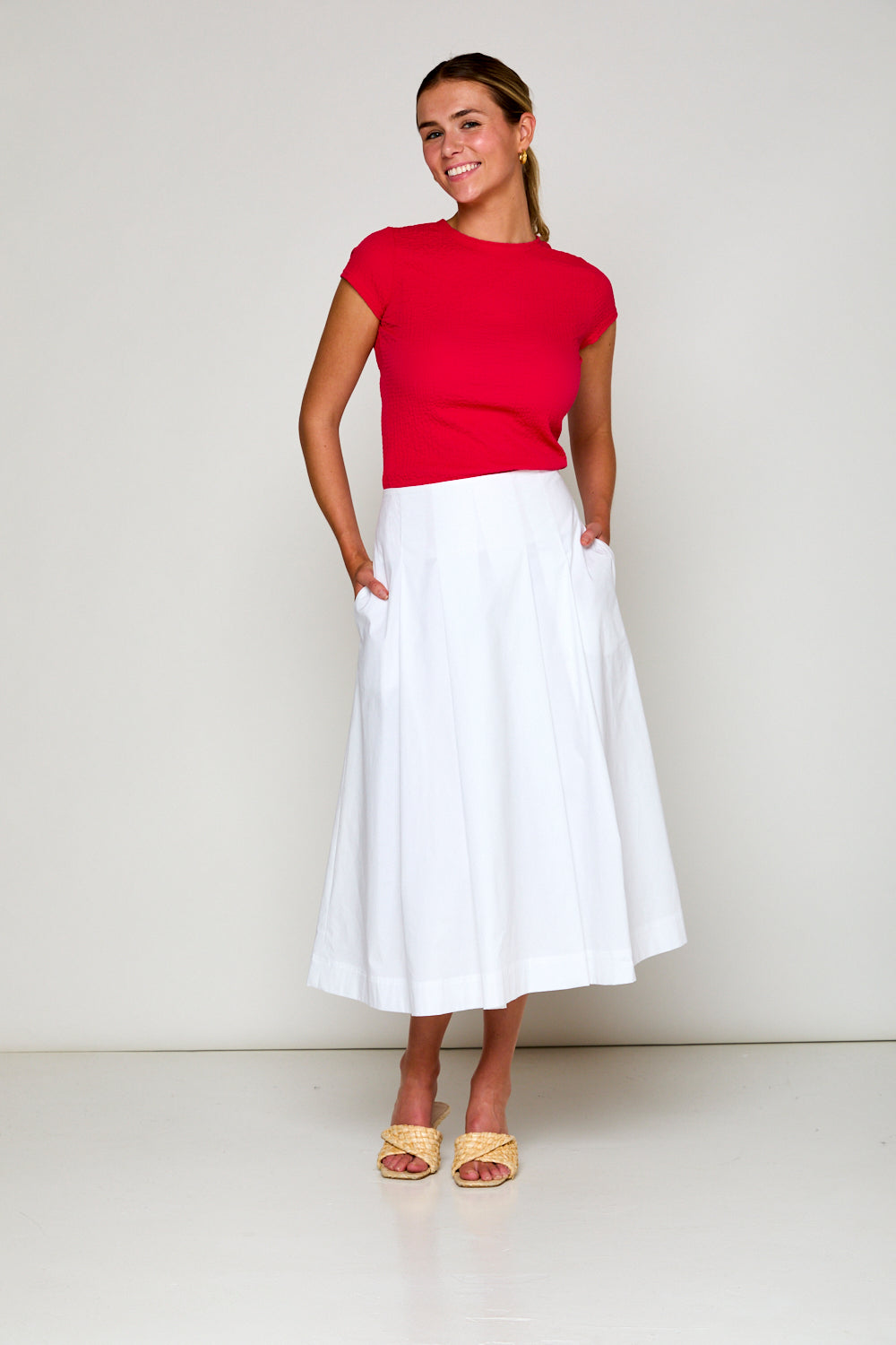 Woman in white skirt