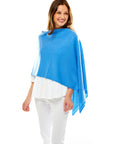 Woman in cashmere poncho