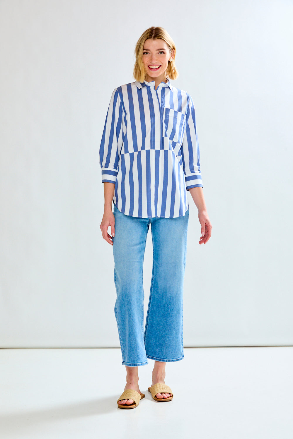 Woman in blue striped shirt