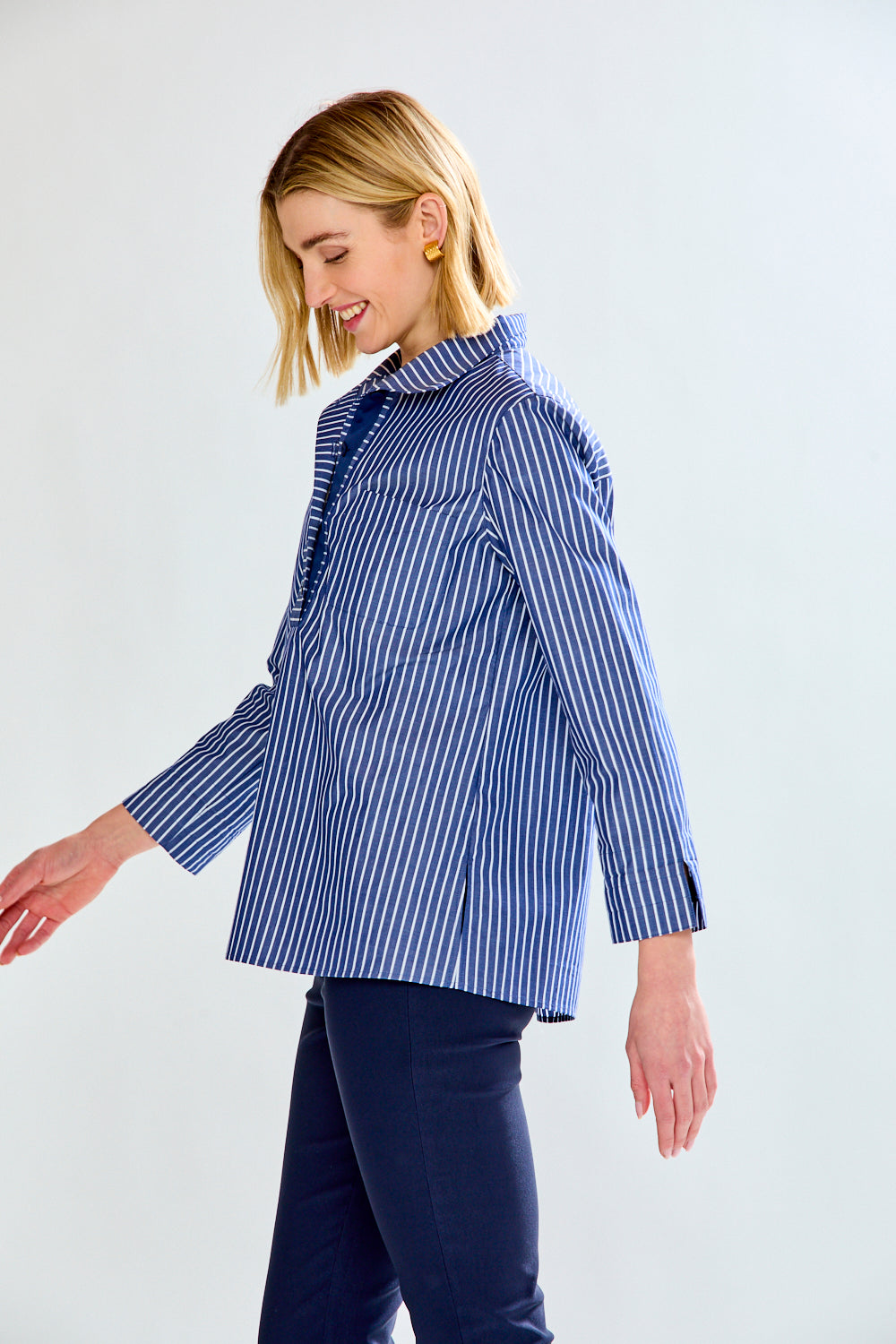 Woman in blue striped blouse